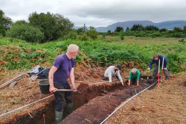 Archaeologists and volunteers at work at the site of the possible cursus monument. PIC: Contributed.