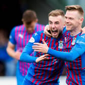 Billy McKay and Lewis Jamieson celebrate an Inverness goal in the 4-2 win over Elgin City in the SPFL Trust Trophy third round tie at Borough Briggs (Photo by Mark Scates / SNS Group)