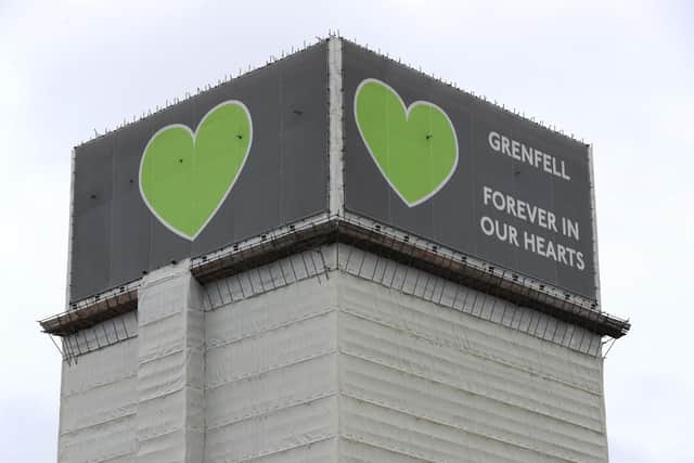 Photo of The Grenfell Tower, as Scottish Government budget to remove potentially dangerous Grenfell-style cladding has been cut