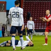 Aberdeen's Curtis Main is yellow carded for a foul on Rangers' Borna Barisic during a Scottish Premiership match between Aberdeen and Rangers at Pittodrie, on January 10, 2021, in Aberdeen, Scotland. (Photo by Craig Williamson / SNS Group)