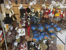 Customers at Ye Olde Christmas Shoppe have been snapping up all sorts of Scottish-themed baubles and trinkets -- including novelty waving Queen decorations, which are now sold out. Picture: Ilona Amos