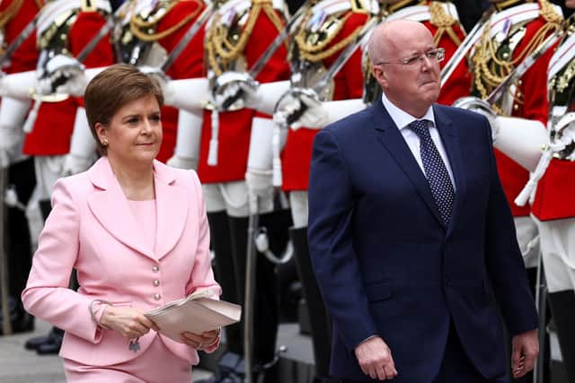 Former First Minister Nicola Sturgeon and her husband Peter Murrell pictured in June last year at a National Service of Thanksgiving at St Paul's Cathedral, London. Ms Sturgeon has said she had no prior knowledge of Mr Murrell's arrest as part of an investigation into SNP finances this morning (Wednesday). PIC: PA