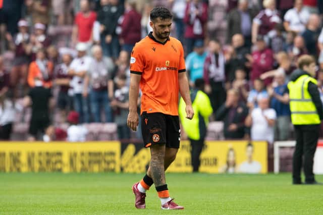 Dundee United's Tony Watt looks dejected at full time after a 4-1 defeat by Hearts at Tynecastle.