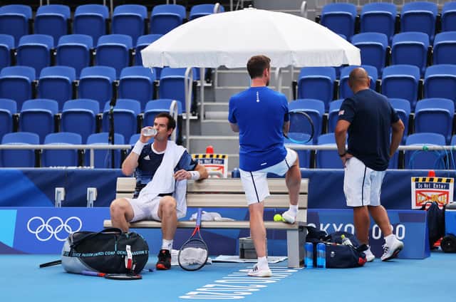 Andy Murray takes a breather during practice in Tokyo.