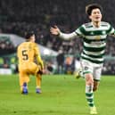 Celtic's Kyogo Furuhashi celebrates his goal to make it 3-0 against Livingston, which means he has netted on average every 82 minutes in tbagging 18 cinch Premiership goals this season. (Photo by Ross MacDonald / SNS Group)
