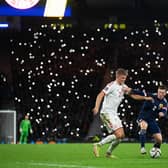 Callum McGregor and Andreas Cornelius battle under the twinkling lights of Hampden. (Photo by Craig Foy / SNS Group)