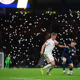 Callum McGregor and Andreas Cornelius battle under the twinkling lights of Hampden. (Photo by Craig Foy / SNS Group)