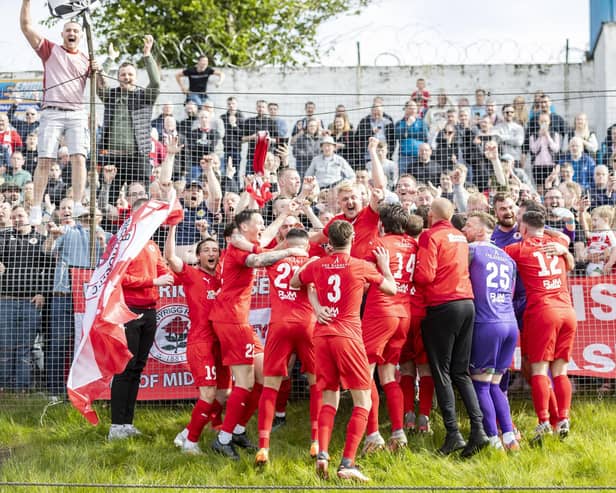 The Bonnyrigg Rose players celebrate promotion to the SPFL after overcoming Cowdenbeath.