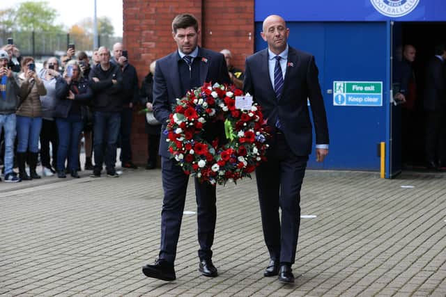 Rangers manager Steven Gerrard and assistant Gary McAllister lay a wreath in memory of Walter Smith, who has passed away aged 73, on October 27. (Photo by Alan Harvey / SNS Group)