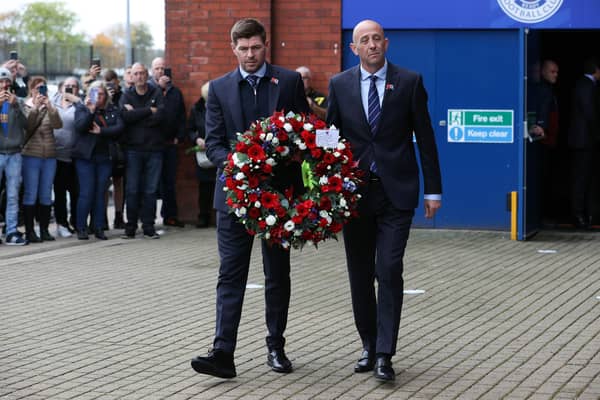 Rangers manager Steven Gerrard and assistant Gary McAllister lay a wreath in memory of Walter Smith, who has passed away aged 73, on October 27. (Photo by Alan Harvey / SNS Group)