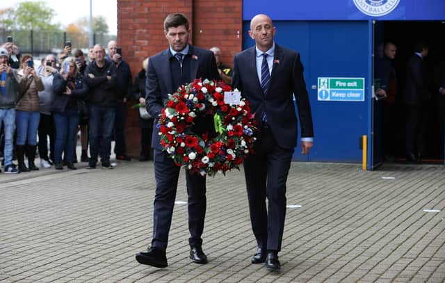 Rangers manager Steven Gerrard and assistant Gary McAllister lay a wreath in memory of Walter Smith, who has passed away aged 73, on October 27. (Photo by Alan Harvey / SNS Group)