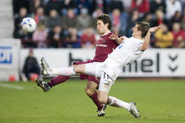 Hearts' Lee Johnson (left) challenges for the ball with Danny Griffin during a 2006 Scottish Cup tie at Tynecastle.