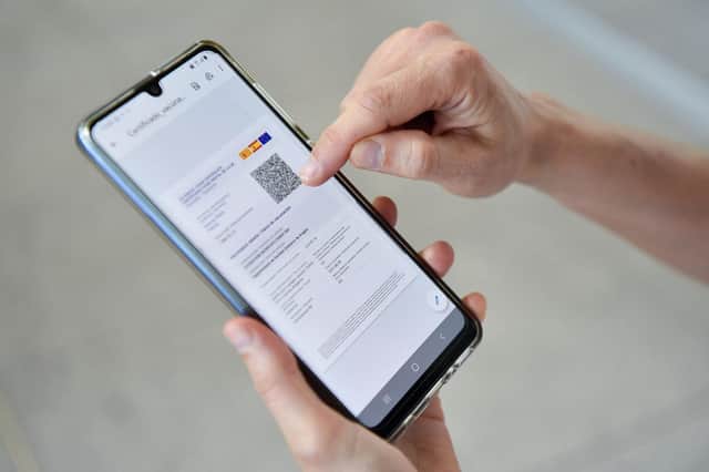 John McLellan has been having trouble with the Covid passport app on his smartphone (Picture: AFP via Getty Images)