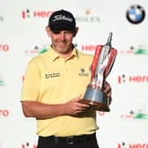 Stephen Gallacher holds his trophy after his most recent European Tour win in the 2019 Hero Indian Open in New Delhi. Picture: Money Sharma/AFP via Getty Images.