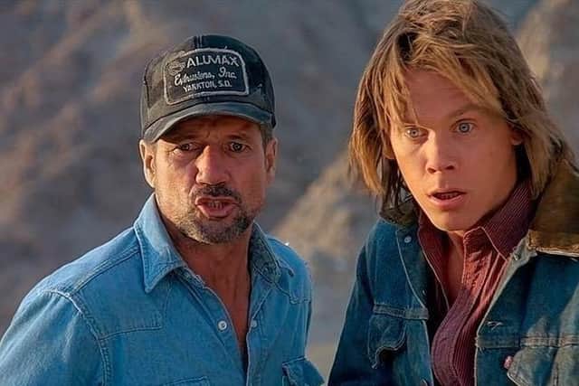 Kevin Bacon posted this still image from the Tremors movie shoot in tribute to late co-star Fred Ward