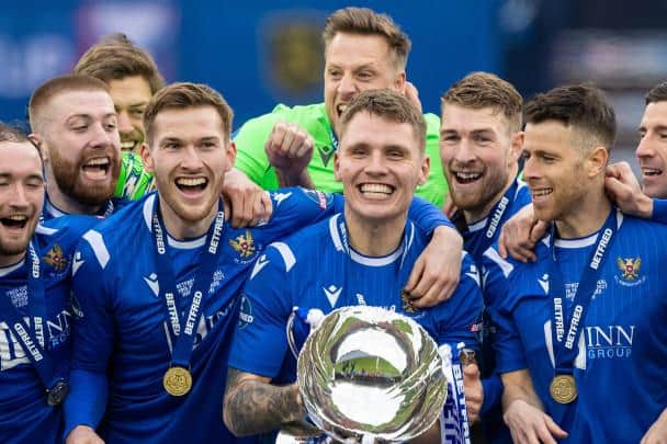St Johnstone's Jason Kerr lifts the Scottish League Cup, then known as the Betfred Cup, on February 28, 2021.