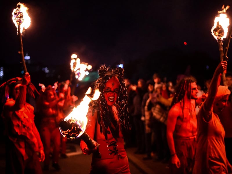 A performer attends the Samhuinn Fire Festival at Holyrood Park, in Edinburgh. Photo by ANDY BUCHANAN / AFP