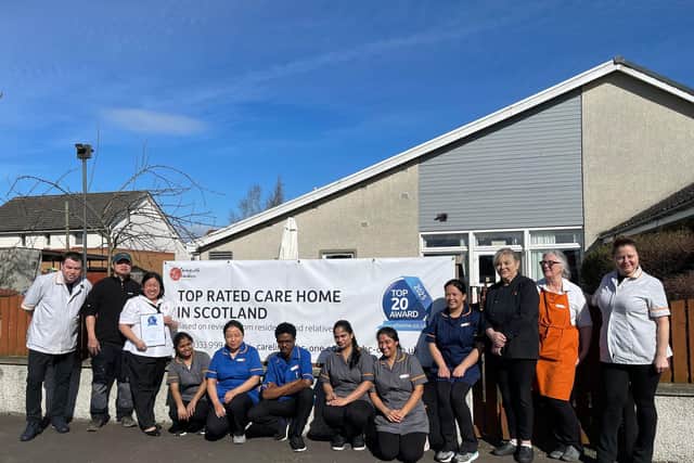 Strathtay House colleagues holding their Carehome.co.uk Awards banner