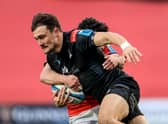 Munster's Paddy Patterson tackles Cole Forbes of Glasgow.