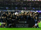 Scotland's players celebrate a famous 20-17 win over England at BT Murrayfield, retaining the Calcutta Cup in the process.