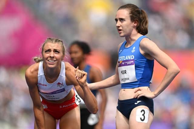 Alexandra Bell of Team England and Laura Muir of Team Scotland react after competing in the Women's 800m Round 1 heats on day five of the Birmingham 2022 Commonwealth Games.