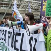 Climate change protesters stage a demonstration outside the Scottish Parliament on 16 September. Picture: Lisa Ferguson