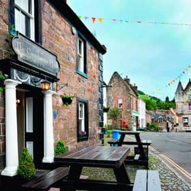 The Covenanter Hotel and Bruce Fountain in the main square in the village of Falkland, Fife, Scotland, are familiar Falkland landmarks from Outlander’s opening season. Pic: Wanderluster/Alamy