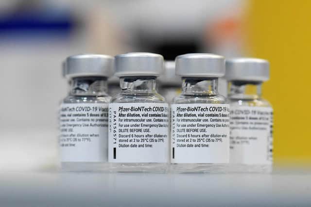 Empty vials of the Pfizer-BioNTech Covid-19 disease vaccine. Picture: Thomas Kienzle/AFP via Getty Images