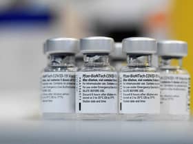 Empty vials of the Pfizer-BioNTech Covid-19 disease vaccine. Picture: Thomas Kienzle/AFP via Getty Images