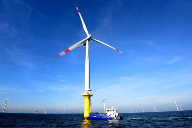 Workers do not have the same rights at sea as they do on land or even when tied up to a turbine (Picture: Tobias Schwarz/AFP via Getty Images)