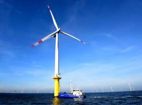 Workers do not have the same rights at sea as they do on land or even when tied up to a turbine (Picture: Tobias Schwarz/AFP via Getty Images)