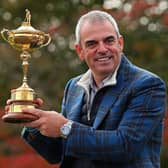 Victorious European captain Paul McGinley poses with the Ryder Cup after his side's success at Gleneagles in 2014. Picture: Mike Ehrmann/Getty Images.