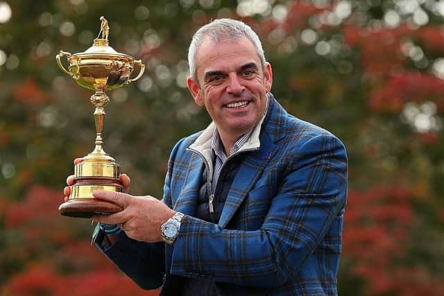 Victorious European captain Paul McGinley poses with the Ryder Cup after his side's success at Gleneagles in 2014. Picture: Mike Ehrmann/Getty Images.