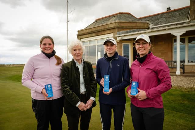 Scottish amateur legend Belle Robertson presented the trophies to Lorna McClymont, Jasmine Mackintosh and Jennifer Saxton after the trio joined forces to land Scotland the team prize in the 50th anniversary staging of the Helen Holm Scottish Women's Open at Troon. Picture: Scottish Golf.