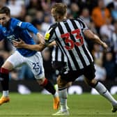 Rangers winger Scott Wright takes on Newcastle's Dan Burn during Allan McGregor's testimonial match at Ibrox. (Photo by Alan Harvey / SNS Group)