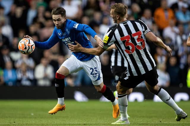 Rangers winger Scott Wright takes on Newcastle's Dan Burn during Allan McGregor's testimonial match at Ibrox. (Photo by Alan Harvey / SNS Group)