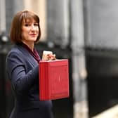 Chancellor of the Exchequer, Rachel Reeves, poses with the red Budget Box