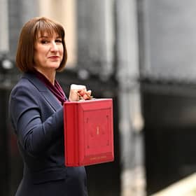 Chancellor of the Exchequer, Rachel Reeves, poses with the red Budget Box