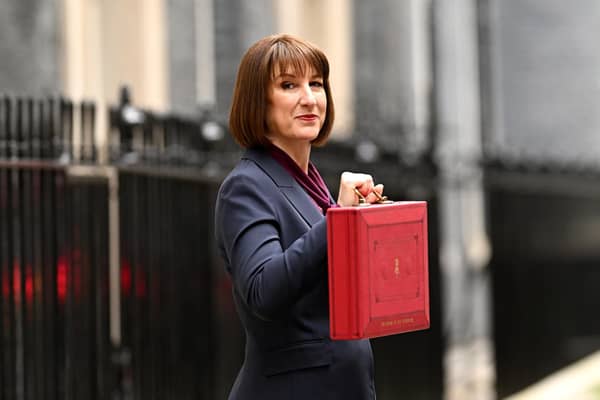 Chancellor of the Exchequer, Rachel Reeves, poses with the red Budget Box