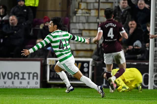 Celtic's Reo Hatate wheels away to celebrate after scoring the opener against Hearts. (Photo by Rob Casey / SNS Group)