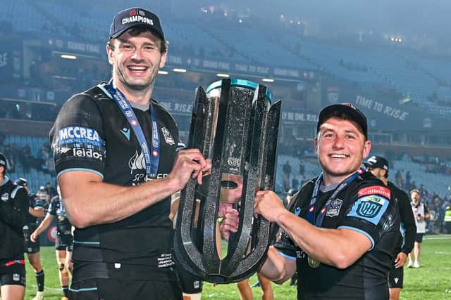 Glasgow Warriors' Richie Gray and Duncan Weir with the URC trophy after the win over the Vodacom Bulls at Loftus Versfeld. (Photo by Anton Geyser/SNS Group)