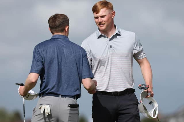 Jamie Roberts shakes hands with one of his playing partners after carding a four-under 66 at Royal Lytham in the opening qualifying round in the R&A Amateur Championship. Picture: Matthew Lewis/R&A/R&A via Getty Images.