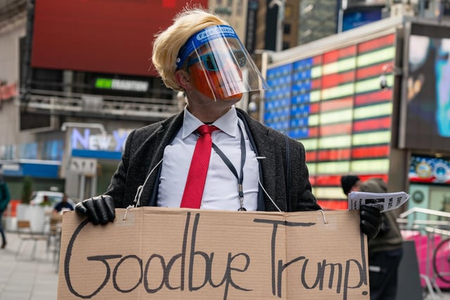 A person dressed as Donald Trump watches Joe Biden being sworn in as 46th President of the United States (Picture: David Dee Delgado/Getty Images)