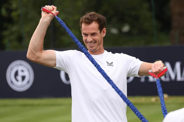 Andy Murray limbers up for Wimbledon in the hope of producing another box-office tournament 10 years on from winning his first title. (Photo by Julian Finney/Getty Images)