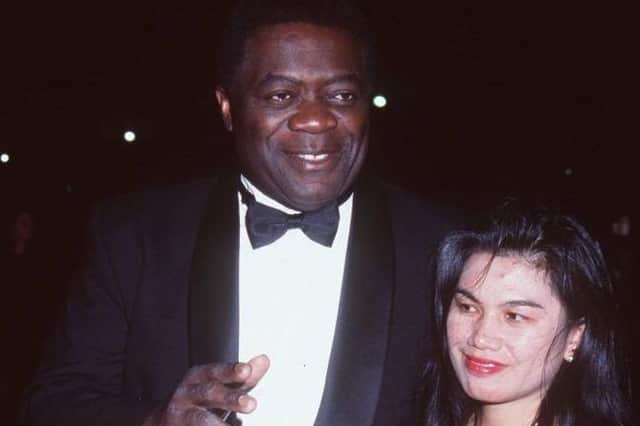 Yaphet Kotto and third wife Tessie Sinahon at the Black American Cinema Society Awards in 1997