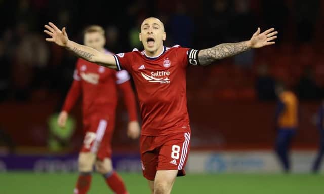 Aberdeen captain Scott Brown was instrumental in his team's impressive display as they drew 1-1 with Rangers at Pittodrie on Tuesday night. (Photo by Craig Williamson / SNS Group)