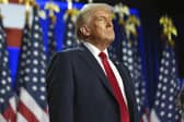 Donald Trump arrives at an election night watch party at the Palm Beach Convention Cente. PIC: AP Photo/Evan Vucci