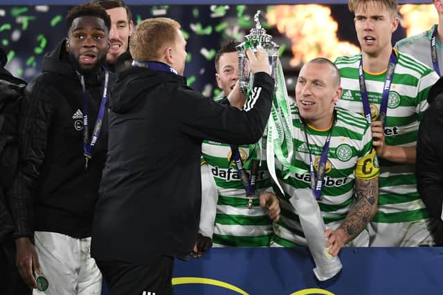Celtic manager Neil Lennon lifts the 2019/2020 Scottish Cup with captain Scott Brown looking on in the celebrations for a triumph completing a quadruple treble for the club. (Photo by Craig Foy / SNS Group)