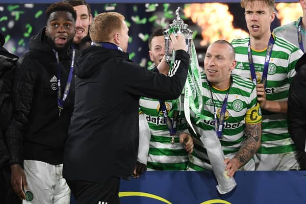 Celtic manager Neil Lennon lifts the 2019/2020 Scottish Cup with captain Scott Brown looking on in the celebrations for a triumph completing a quadruple treble for the club. (Photo by Craig Foy / SNS Group)