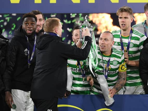 Celtic manager Neil Lennon lifts the 2019/2020 Scottish Cup with captain Scott Brown looking on in the celebrations for a triumph completing a quadruple treble for the club. (Photo by Craig Foy / SNS Group)